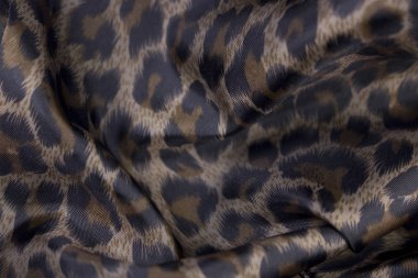 arka plan olarak leopar desenli kumaş görünümünü kapat