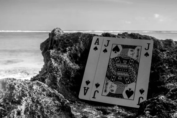 black jack poker card gamble beach theme black and white