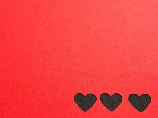 Rood Papier Ponsen Een Hartvorm Geplaatst Zwart Papier Voor Achtergrond — Stockfoto