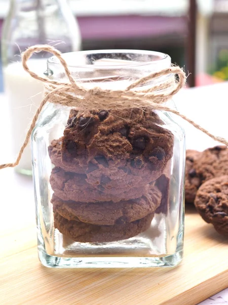 Close Homemade Double Chocolate Chip Cookies Glass Bottle Wooden Plate — Stock Photo, Image
