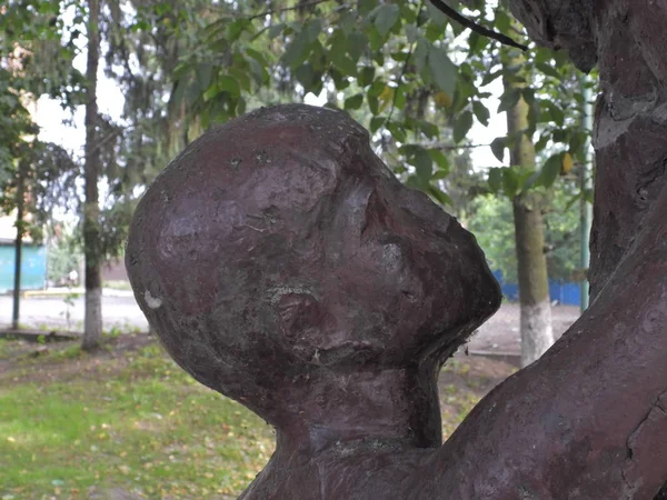 Communist bronze statue dedicated to sports in a city park