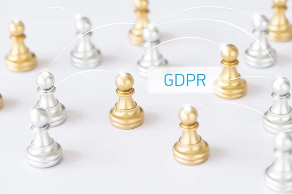 Chess set with other on white background, concept as communication and GDPR word, General Data Protection Regulation