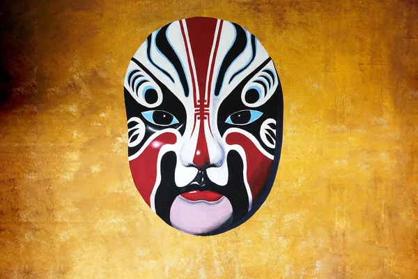 Chinese mask on the wall