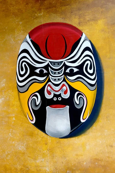 Chinese mask on the wall