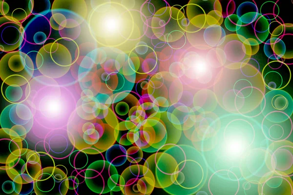 Circle, light, colorful bubbles on a black background