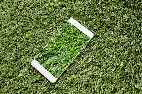 Green grass and technology Mobile phone