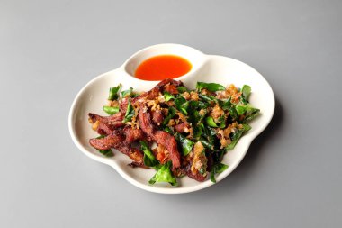 Kızarmış domuz Güney Afrika'da bir kabile kireç yaprakları