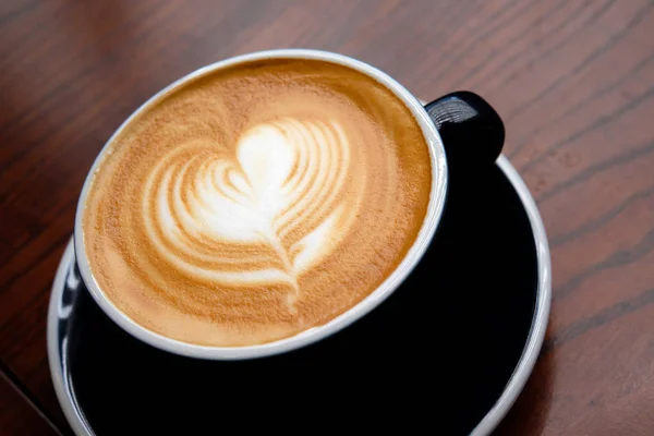 Kaffeekunst Mit Holzhintergrund — Stockfoto