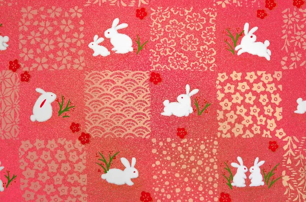 Paper Background with white bunnies