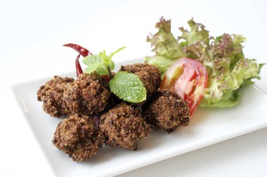 kızartılmış lezzetli Laab domuz.