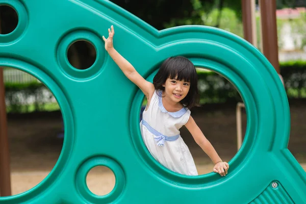 Active little girl on playground