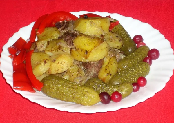 Meat Potatoes Paprika Pickles Cranberries — Stock Photo, Image