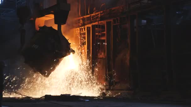 Iron Foundry Background Hot Metal Pours Out Bucket Foreground Move — Stock Video