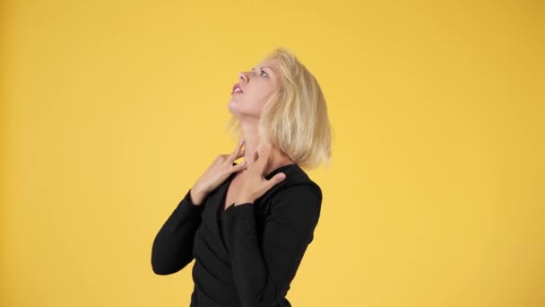 Beautiful Girl White Hair Black Dress Yellow Background Posing Stroking — Stock Video