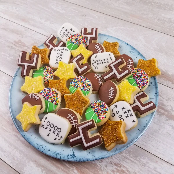Football game day sugar cookies closeup on a platter for fall — ストック写真