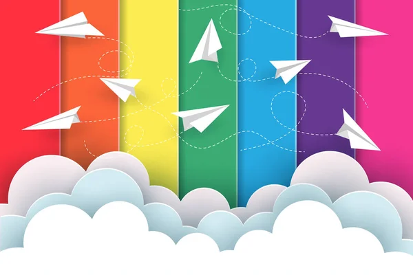 Многие белые бумажные самолеты летают на фоне радуги красочные — стоковый вектор