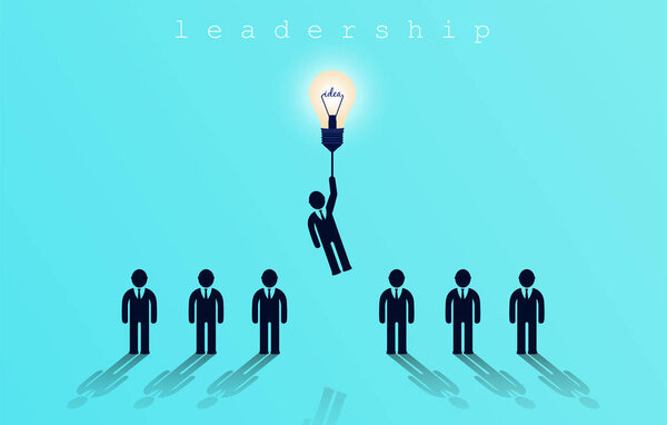 Бизнесмен, летающий на лампочке, концепция лидерства
. 