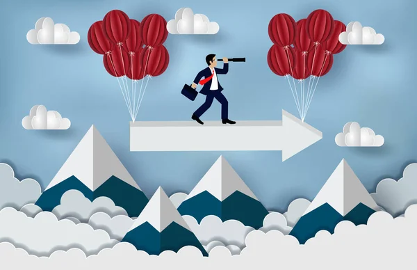 Business Success concept. Businessman standing on a arrow