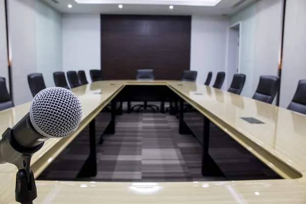 Microphone and modern table boardroom with chair black — Stock Photo, Image