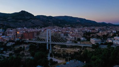 Spain Alcoi Alcoy night view with bridge and city from drone clipart