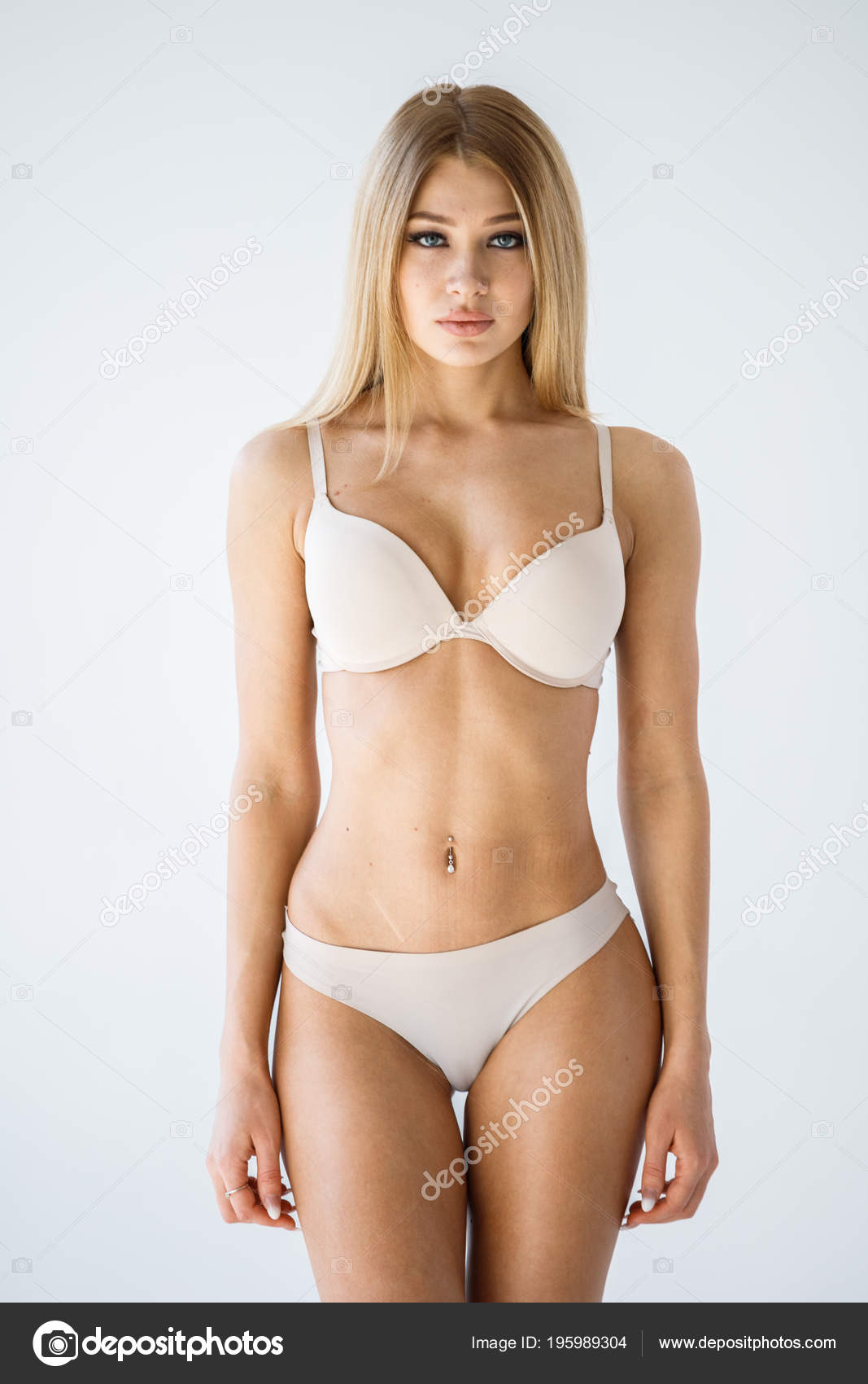 Studio Shot Lovely Blonde Girl Sexy Beige Lingerie Standing White Stock  Photo by ©schummyone 195989304