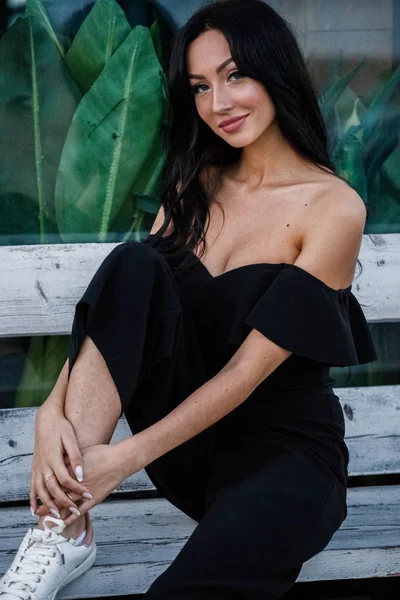 Portrait Beautiful Young Brunette Woman Black Dress Stylish Makeup Sitting — Stock Photo, Image