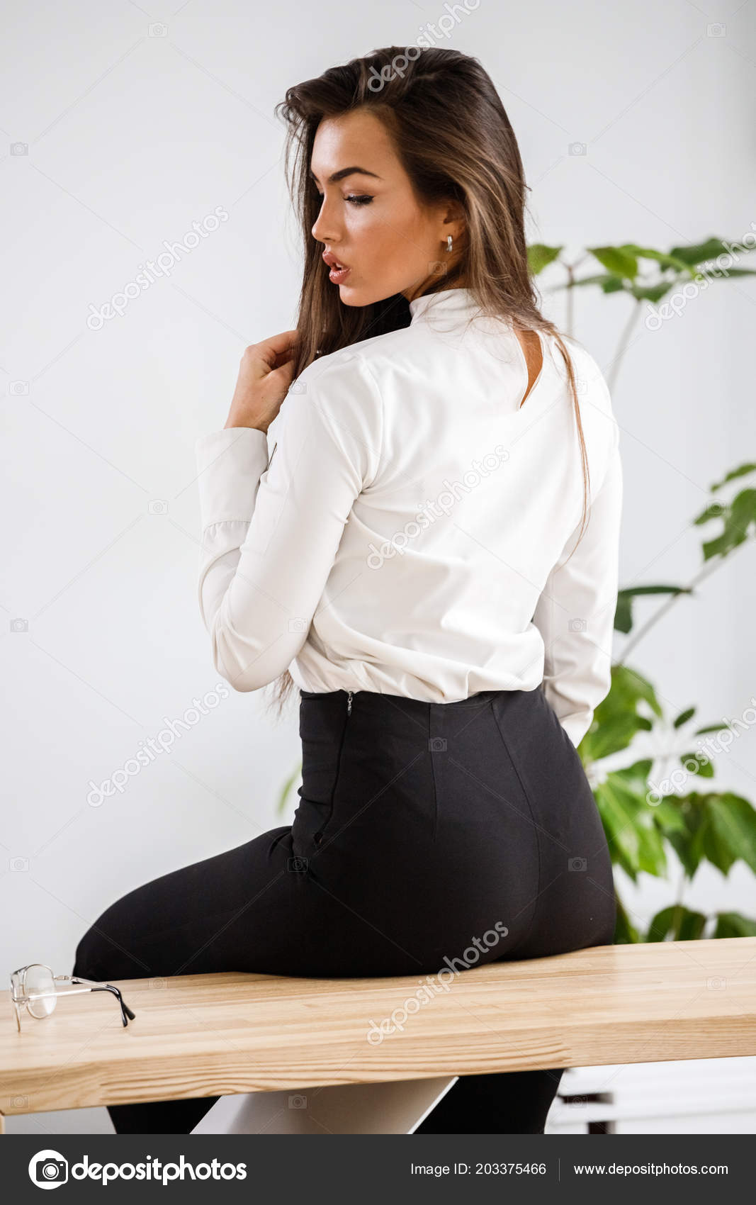 white blouse and black pants