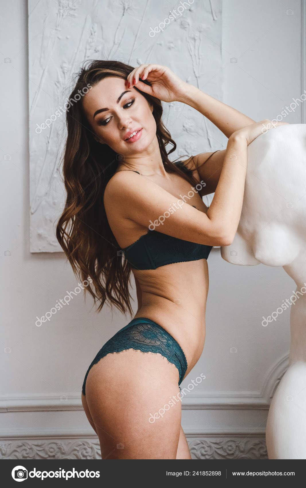 Lovely Brunette Woman Green Lingerie Standing Luxury Apartments Interior  Stock Photo by ©schummyone 241852898