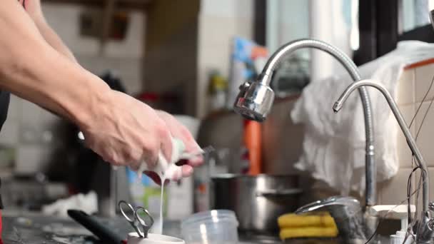 Man Washes Dishes Economical Mode Water Wasted Close Hands Man — Stock Video