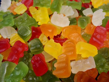 Çeşitli çok renkli sakızlı şekerler closeup soyut arka plan deseni. Renkli jöle marmelat tatlılar Makro fotoğraf. Üstte görüntü