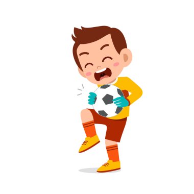 Mutlu çocuk kaleci olarak futbol oynuyor.