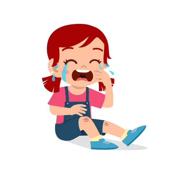 Грустный плач милый ребенок девочка колено болит кровотечение — стоковый вектор