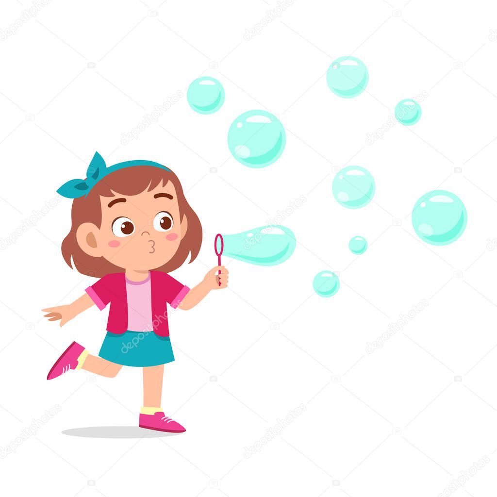 happy cute kid girl blow bubble soap