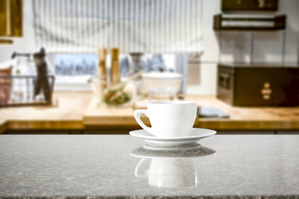 Kitchen table top with empty space for you products or decoration and blurred kitchen furniture background.