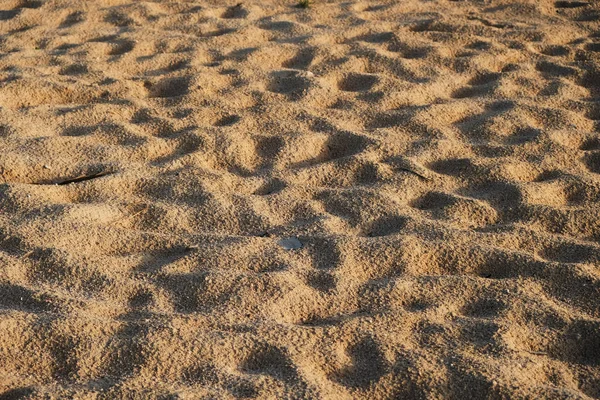Rough golden sand hills texture on the beach — Stock Photo, Image