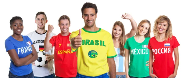 Optimistischer Brasilianischer Fußballfan Mit Fans Aus Anderen Ländern Auf Isoliertem — Stockfoto