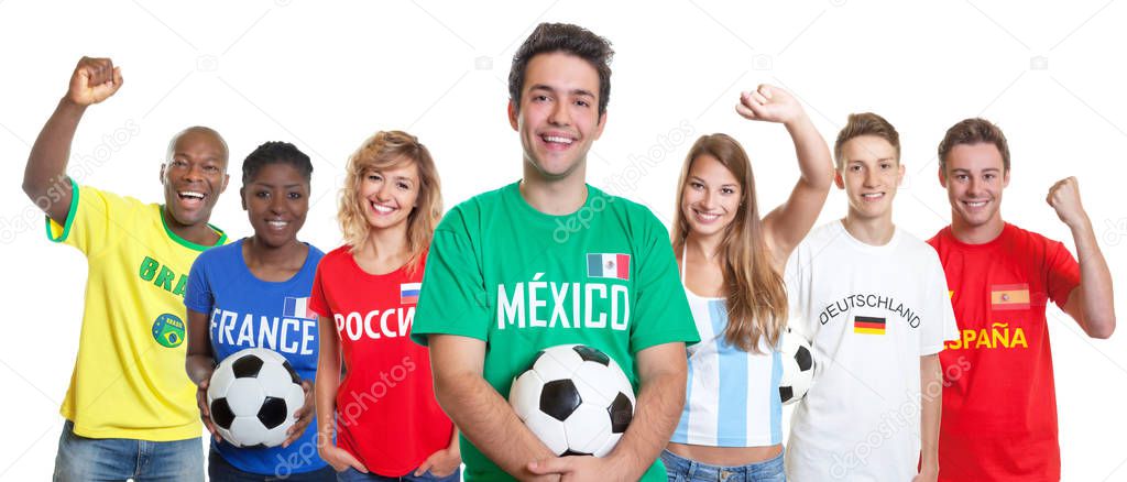 Laughing mexican soccer supporter with ball and fans from other countries on isolated white background for cut out