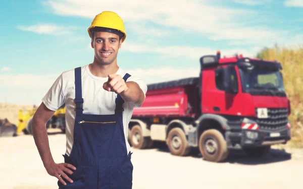 Truck Pointing Latin American Construction Worker Construction Site — Stock Photo, Image