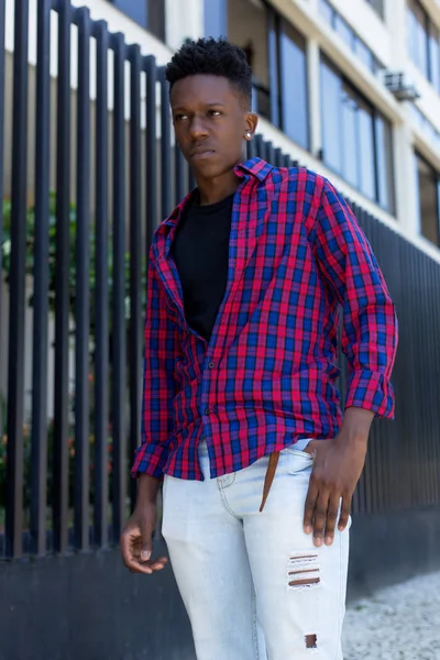 Handsome african american young adult man outdoor in the city
