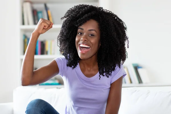 Cheering Successful African American Woman Indoors Home — Stock Photo, Image