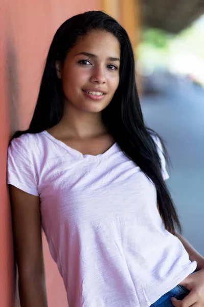 Close up portrait of beautiful latin american teenage girl