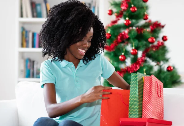 African american woman after shopping christmas gifts — Stock Photo, Image