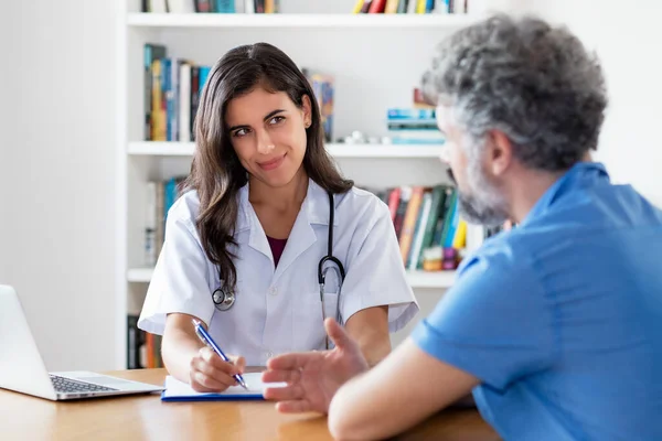 Smiling Mexican Female Doctor Listening Patient Hospital — Stock Photo, Image