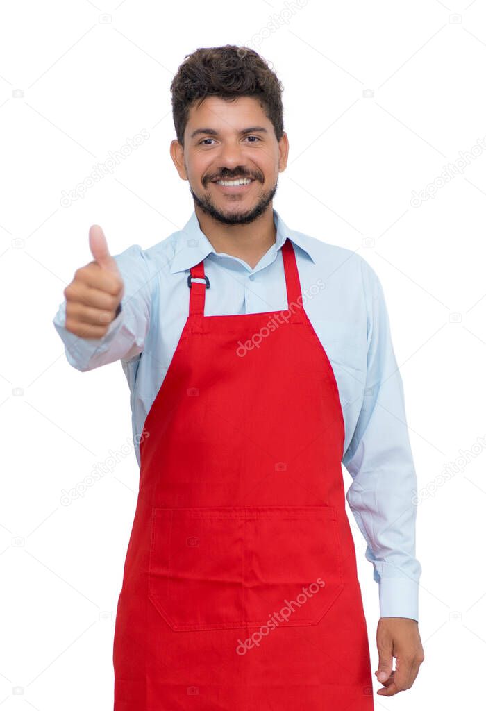 Handsome hispanic waiter showing thumb up isolated on white background for cut out