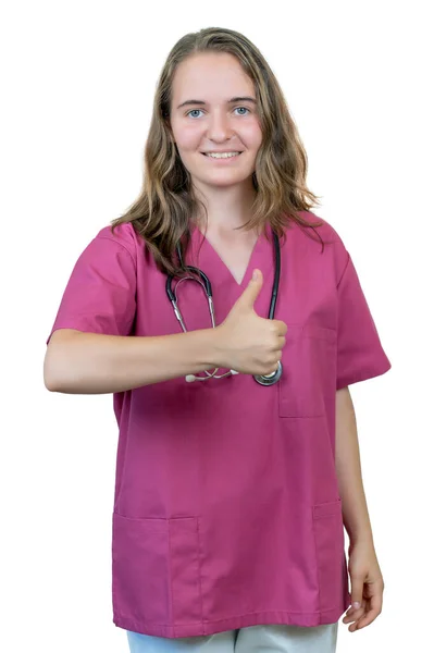 笑いブルネット女性看護師または医学学生ショー親指アップ絶縁上のホワイトバックグランドのためにカット — ストック写真