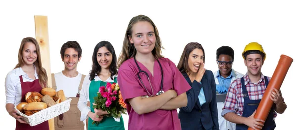 Enfermera Alemana Sonriente Con Grupo Aprendices Internacionales Aislados Sobre Fondo —  Fotos de Stock