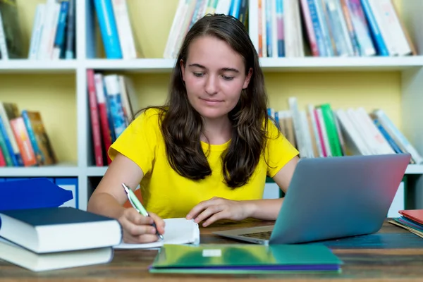 Pretty German Female Student Learning Book Computer Desk Indoors Home — Stock Photo, Image