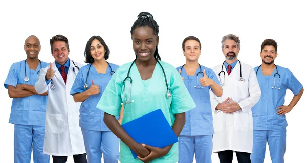 Giovane Infermiera Afro Americana Con Medico Team Medico Isolato Sfondo — Foto Stock