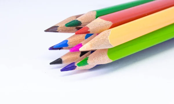 stock image Close up macro shot of color pencil pile pencil nibs, used pencils from a school art room.