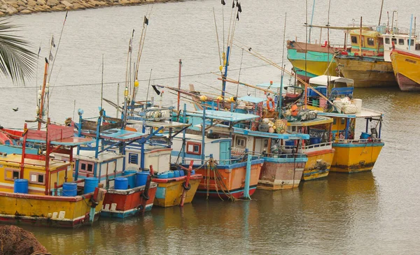 Sri Lankan traditional fishing catamarans, Colorful fishing boats docked docked in the port of Beruwala, Sri Lanka.Srilankan traditional fishing industry. similar to india and asia.